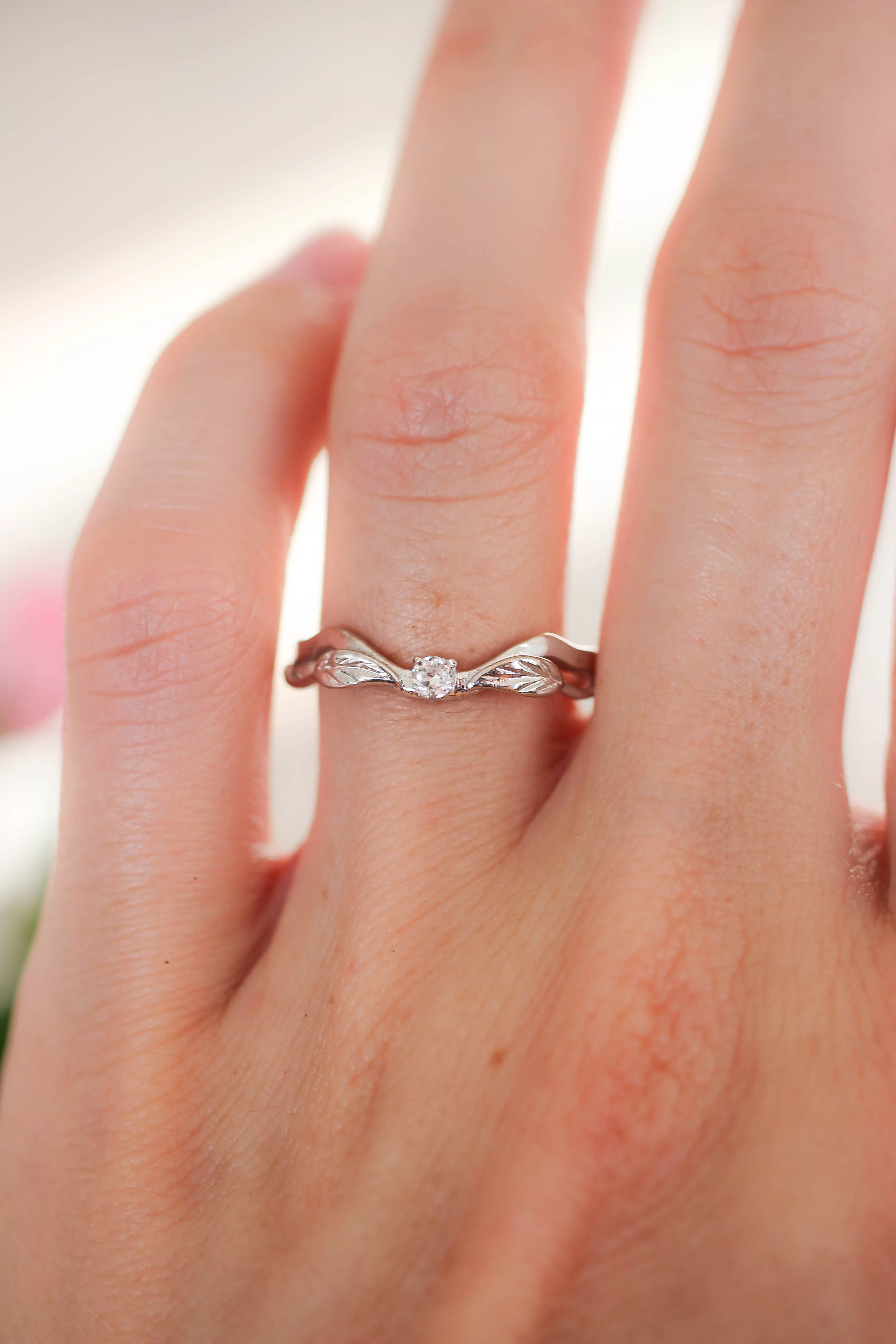 Curved wedding band with one diamond / matching band for Clematis