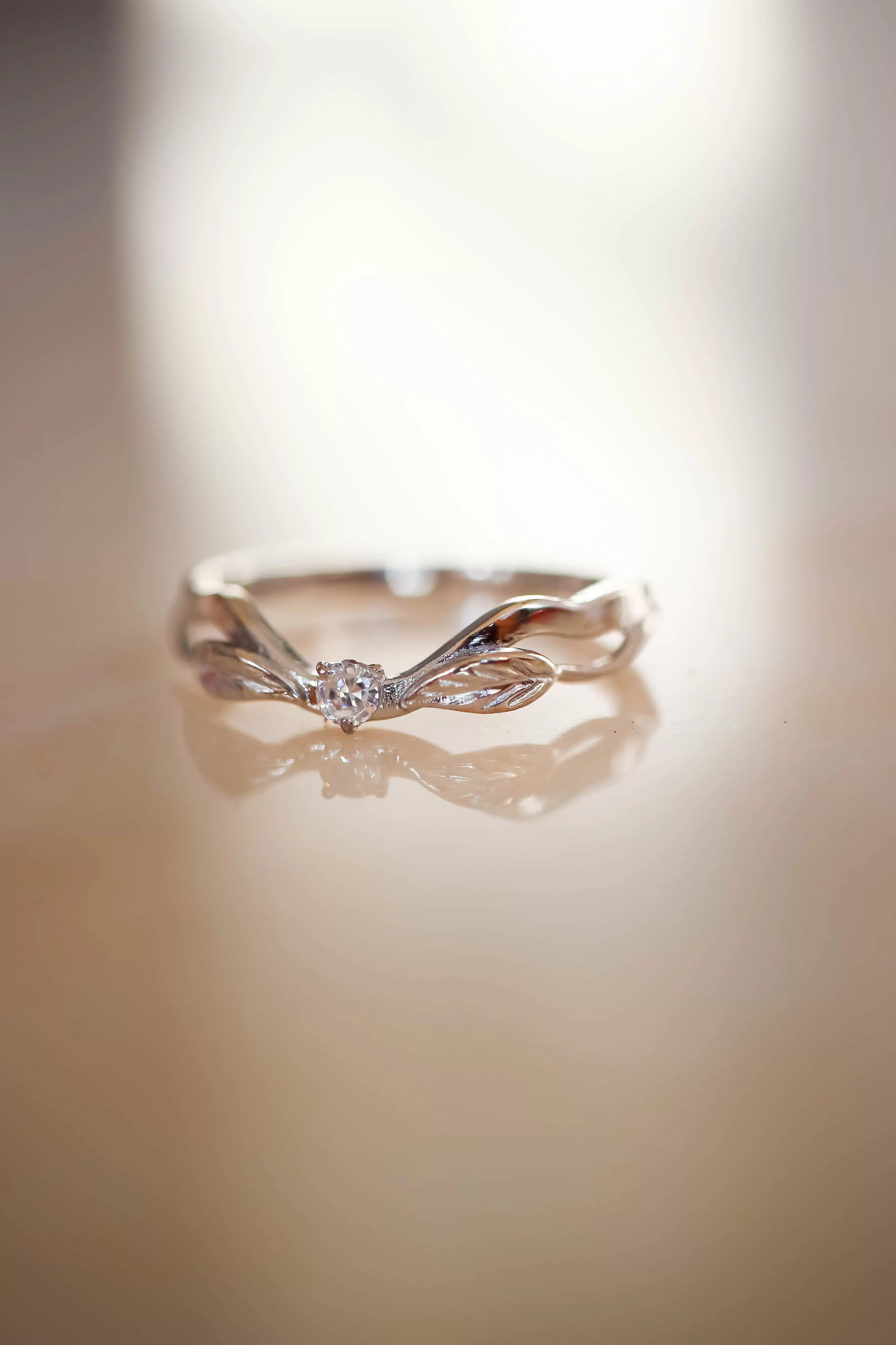 Curved wedding band with one diamond / matching band for Clematis